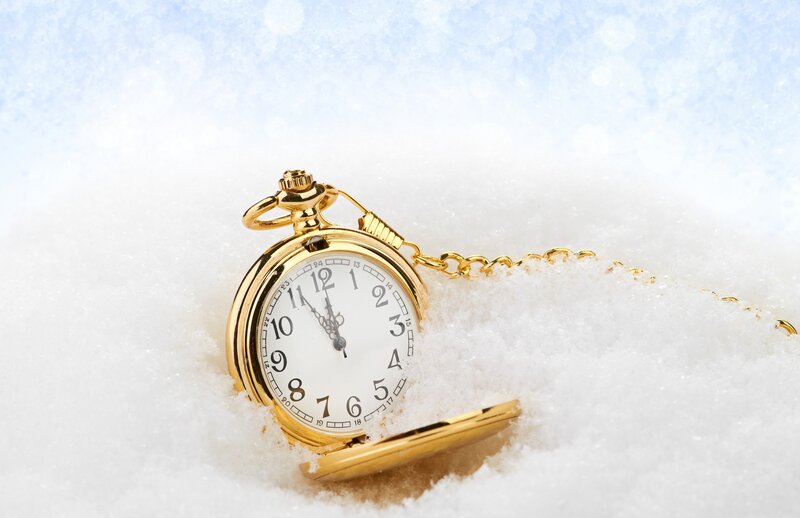 Gold Pocket Watch in Snow