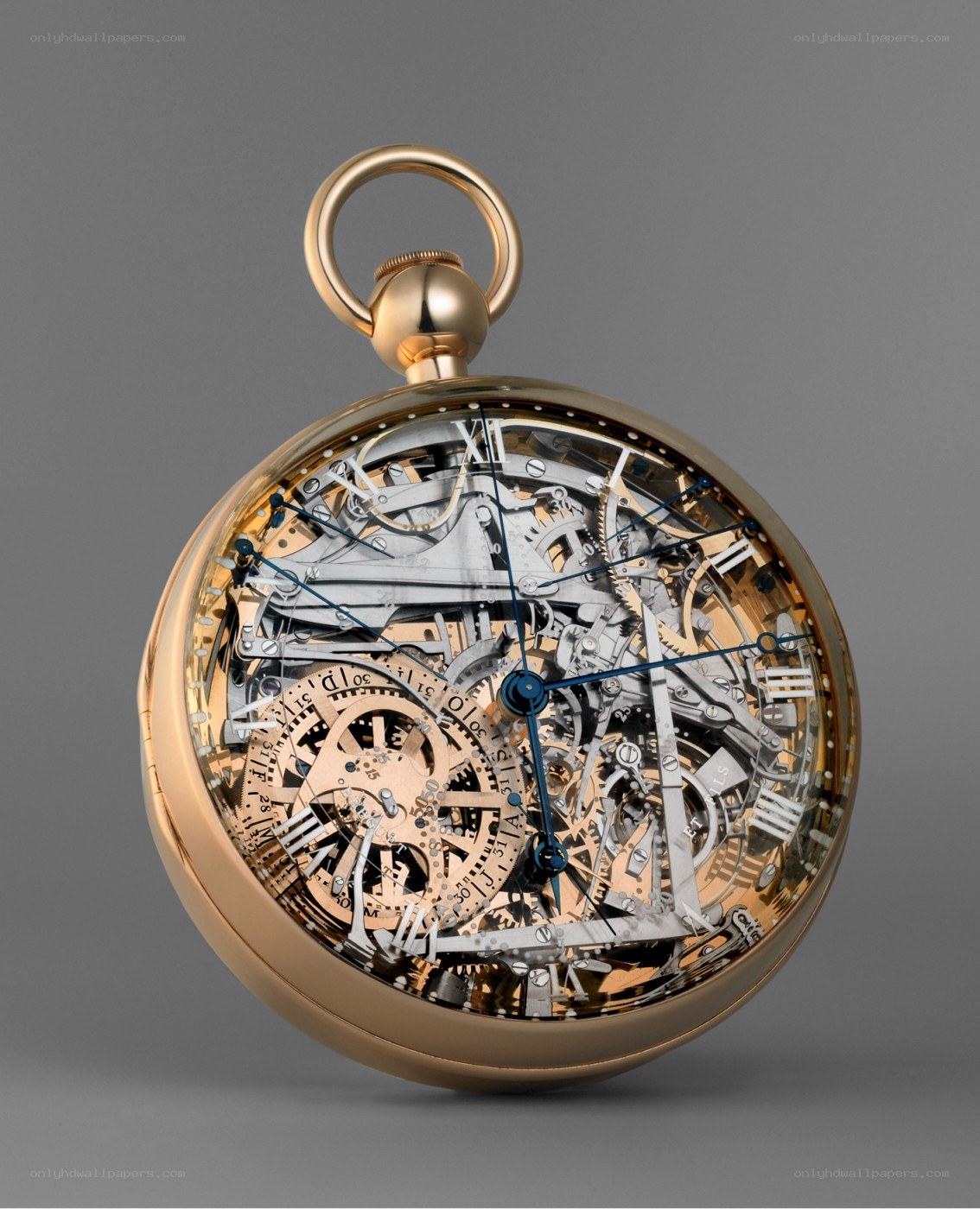 gold pocket watch with skeleton dial
