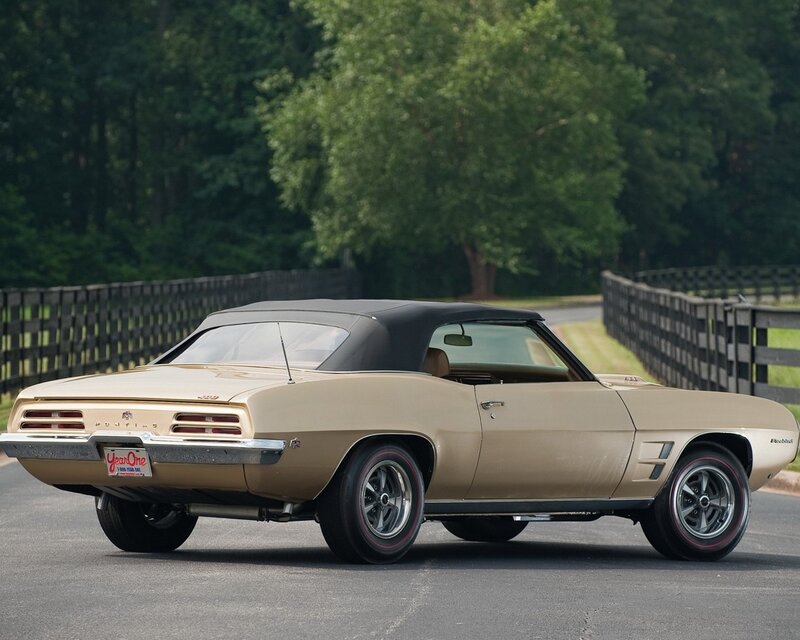Gold Pontiac Firebird convertible