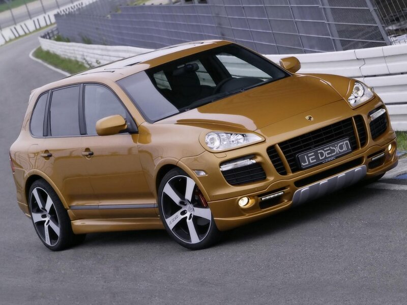 Gold Porsche Cayenne on racetrack