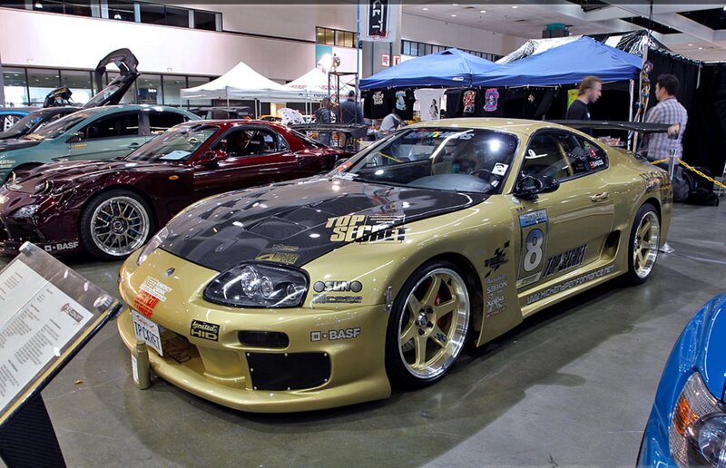 Gold Race Car — Busy