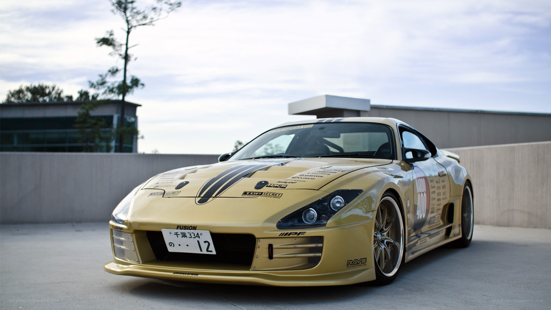 gold race car on rooftop