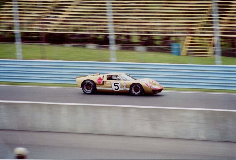 Gold race car on track