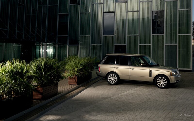 Gold Range Rover in modern setting