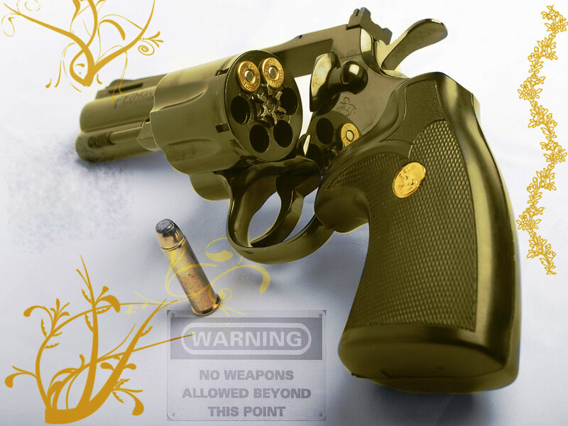 Gold Revolver with Bullet