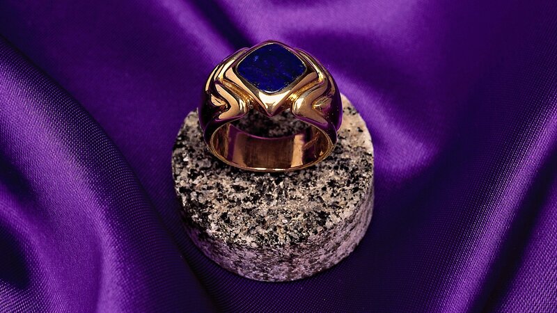 gold ring with blue stone