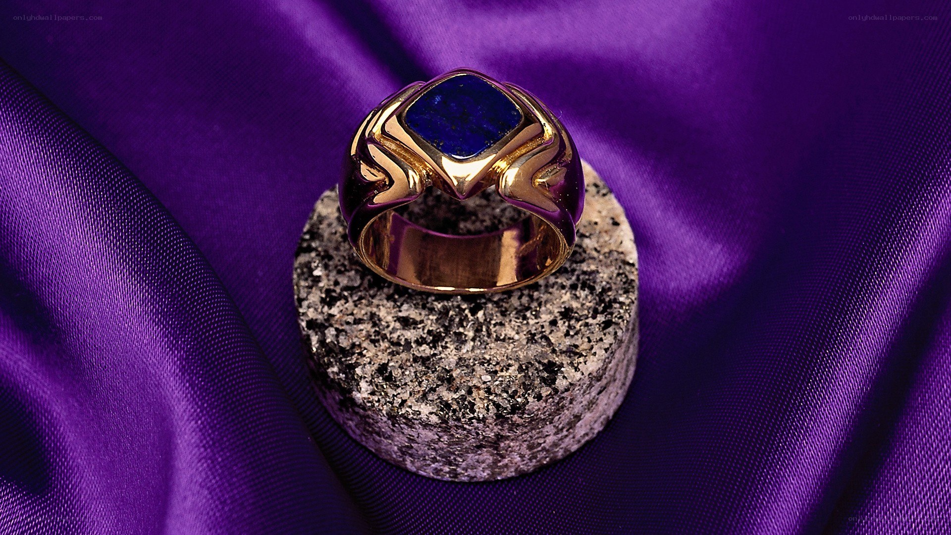 gold ring with blue stone