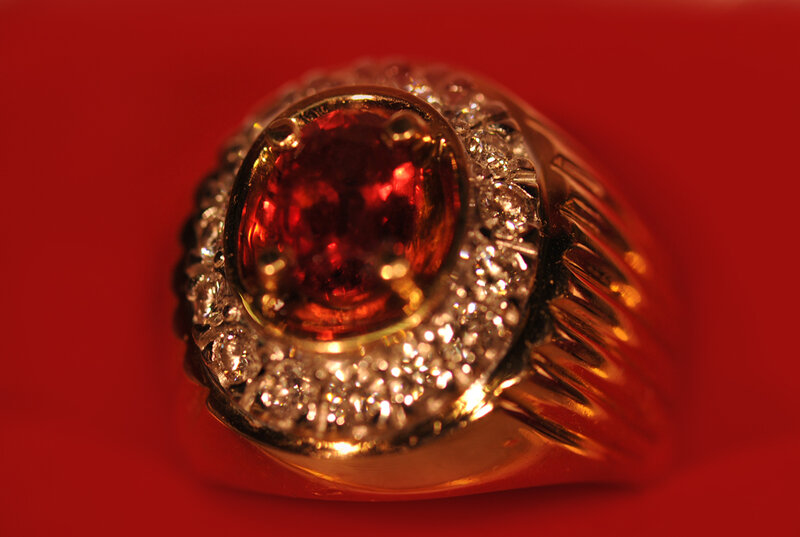Gold Ring with Gemstone — Red, Dramatic, Photograph