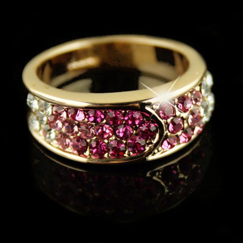 gold ring with pink and clear crystals