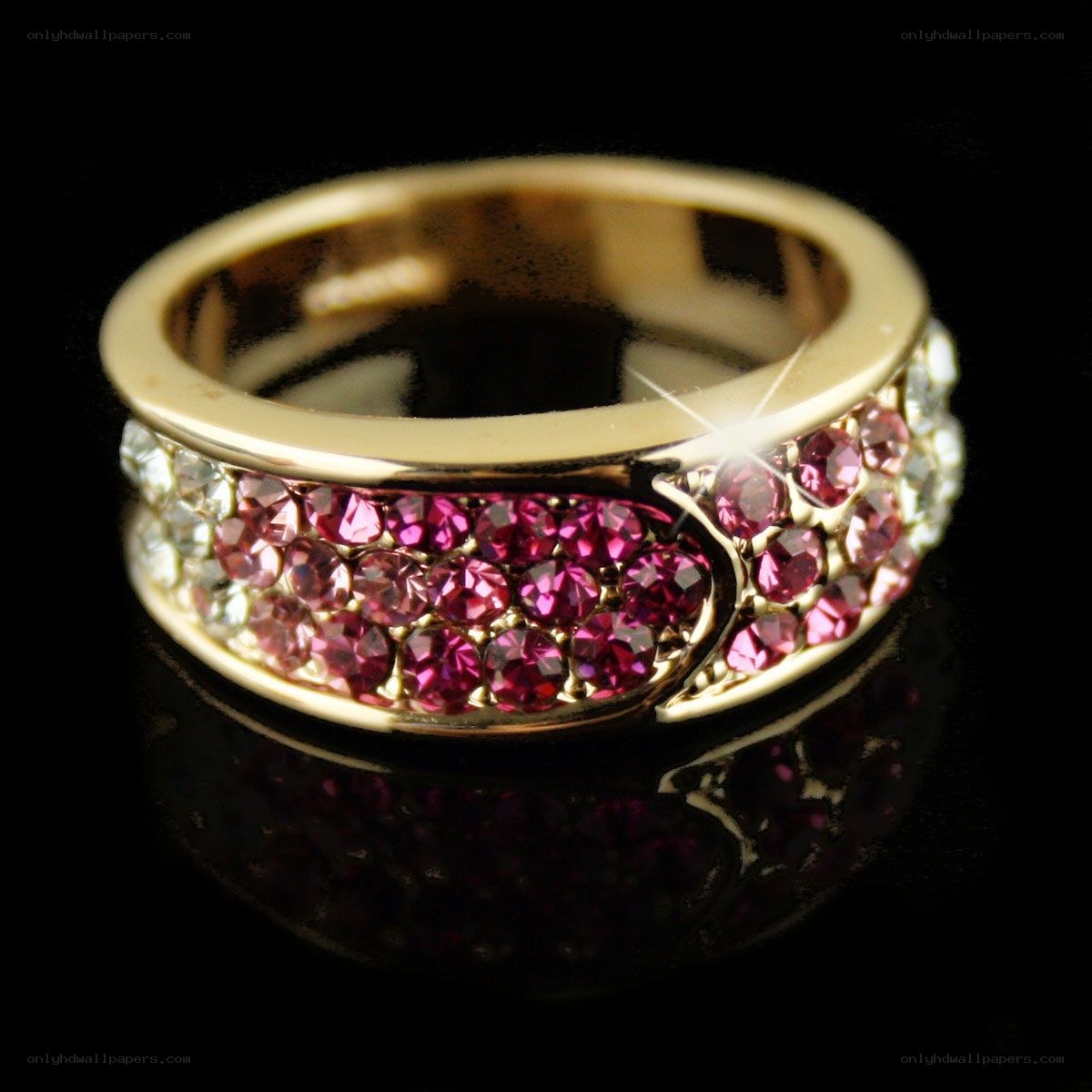 gold ring with pink and clear crystals