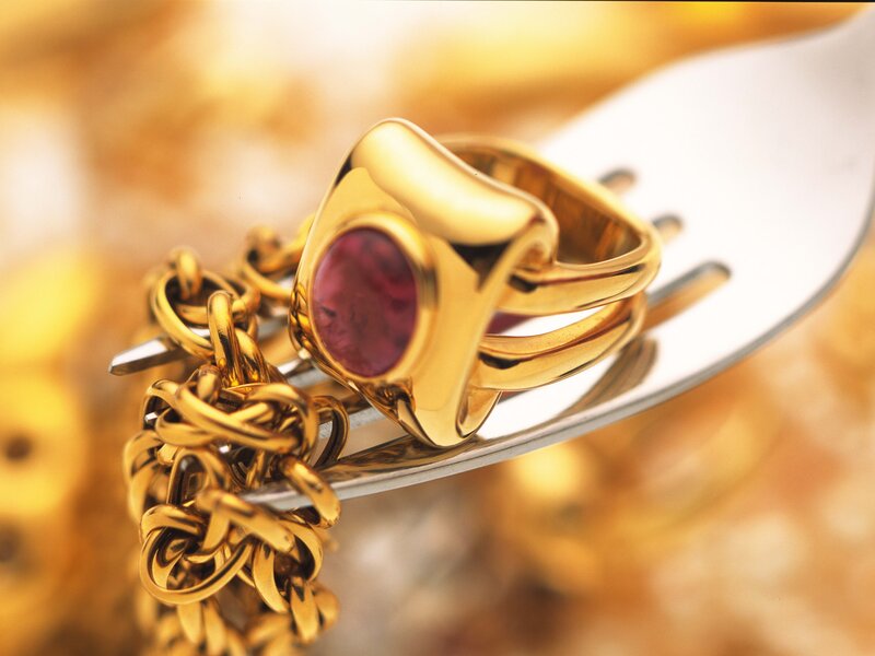 gold ring with ruby on fork