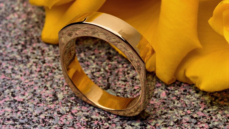 gold ring with yellow rose