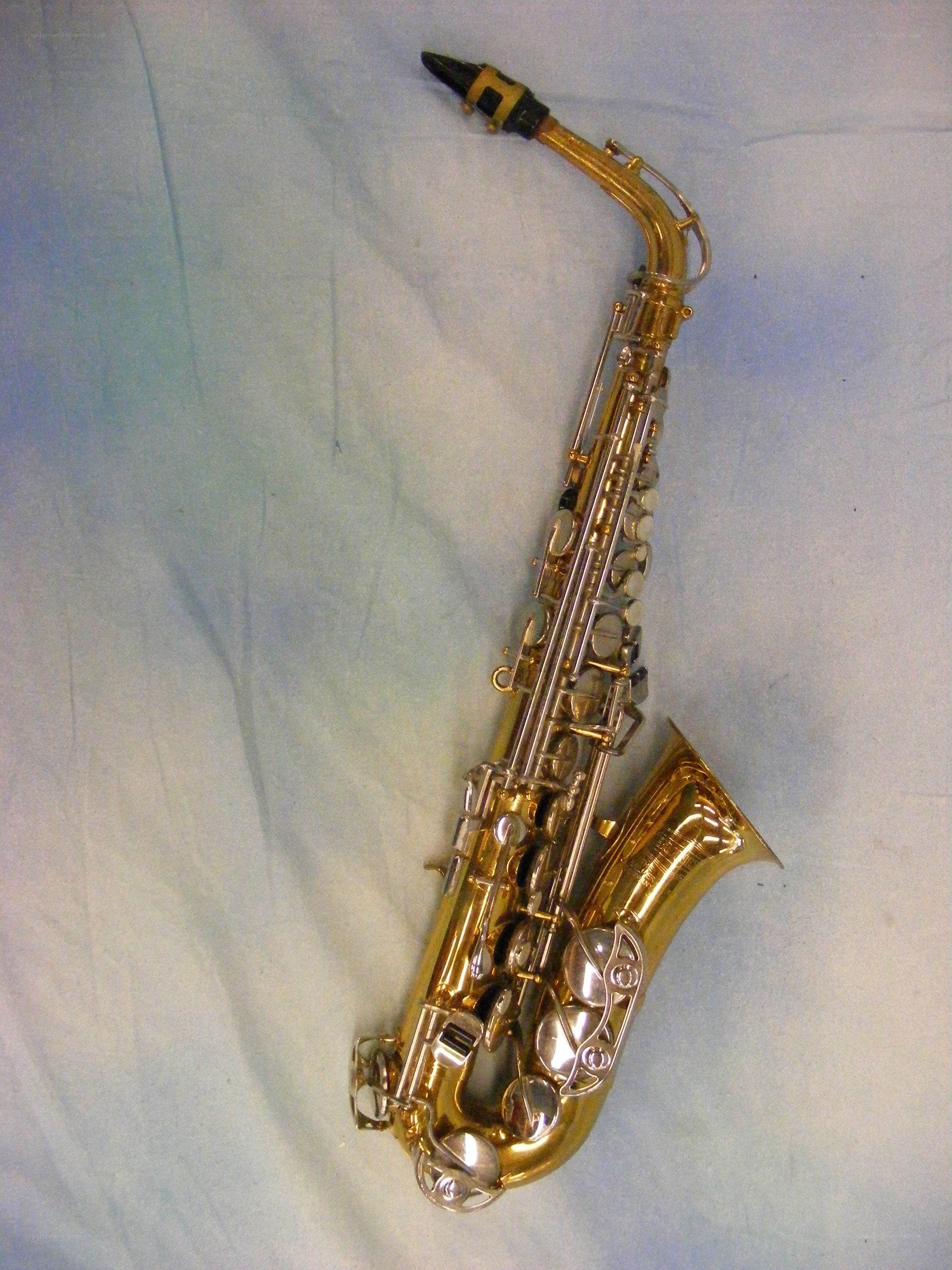 Gold saxophone on fabric
