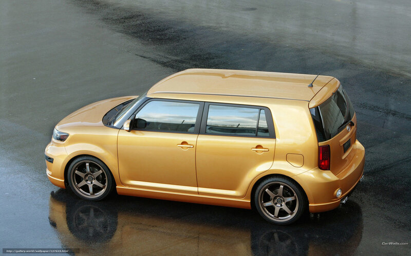 gold scion xB hatchback