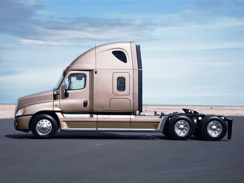gold semi-truck on asphalt