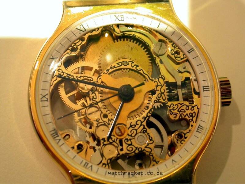 gold skeleton watch