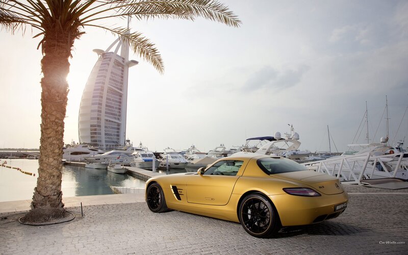 Gold sports car at Dubai marina