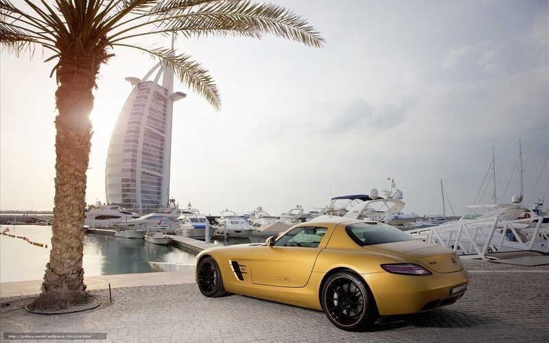 Gold sports car at Dubai marina