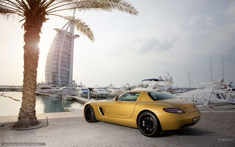 Gold sports car at marina