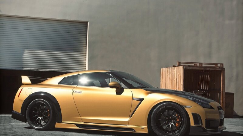 gold sports car in garage