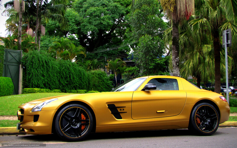Gold sports car on a street