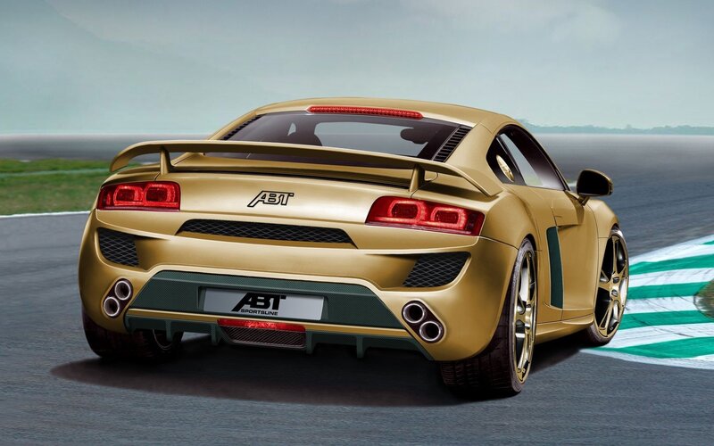 gold sports car on racetrack