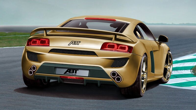 gold sports car on racetrack