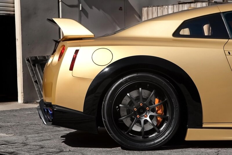 gold sports car rear view