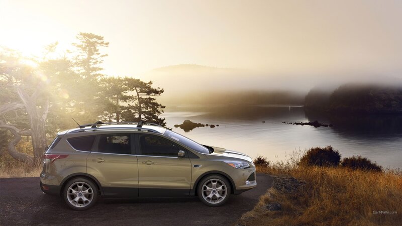Gold SUV on Cliff