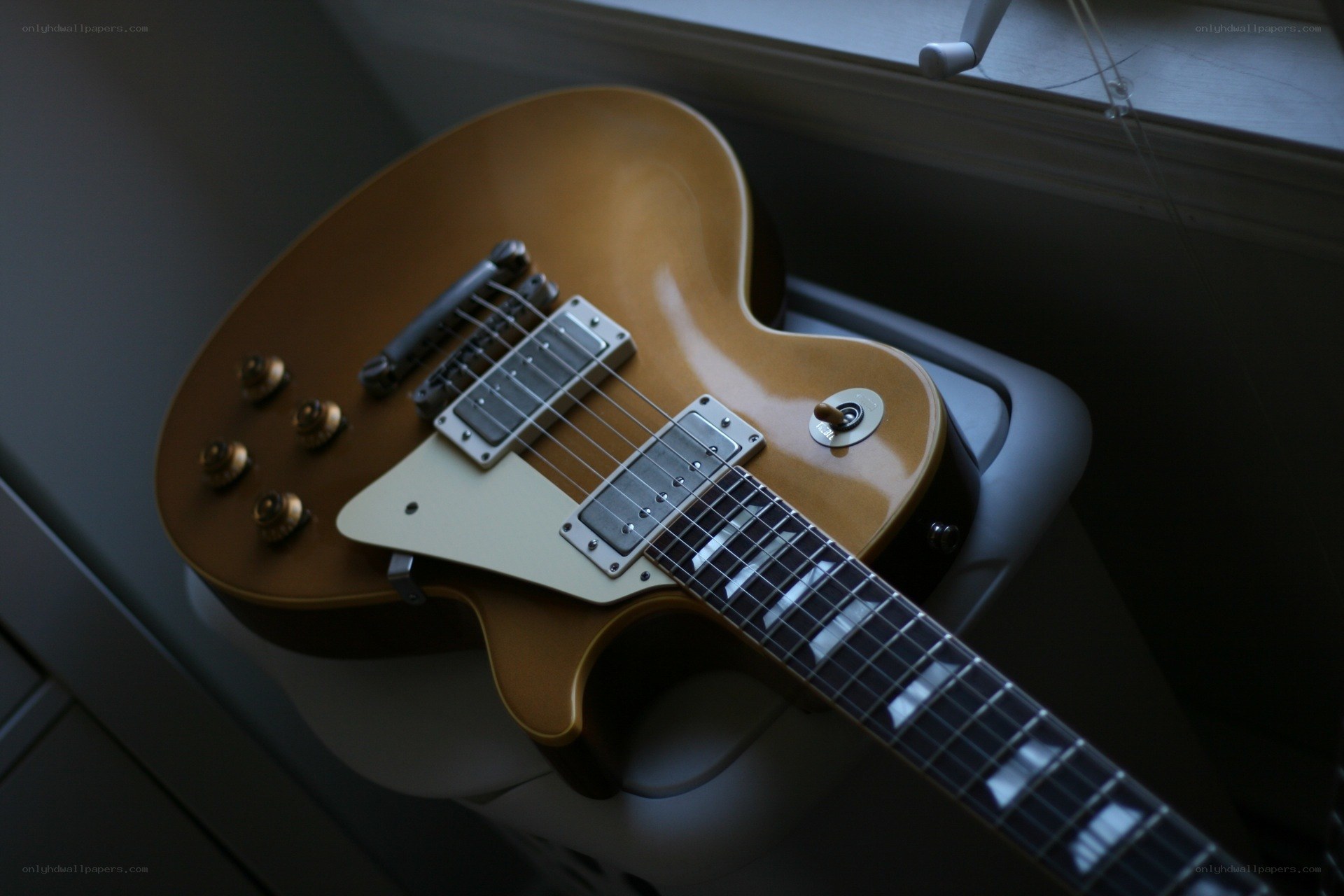 gold-top electric guitar