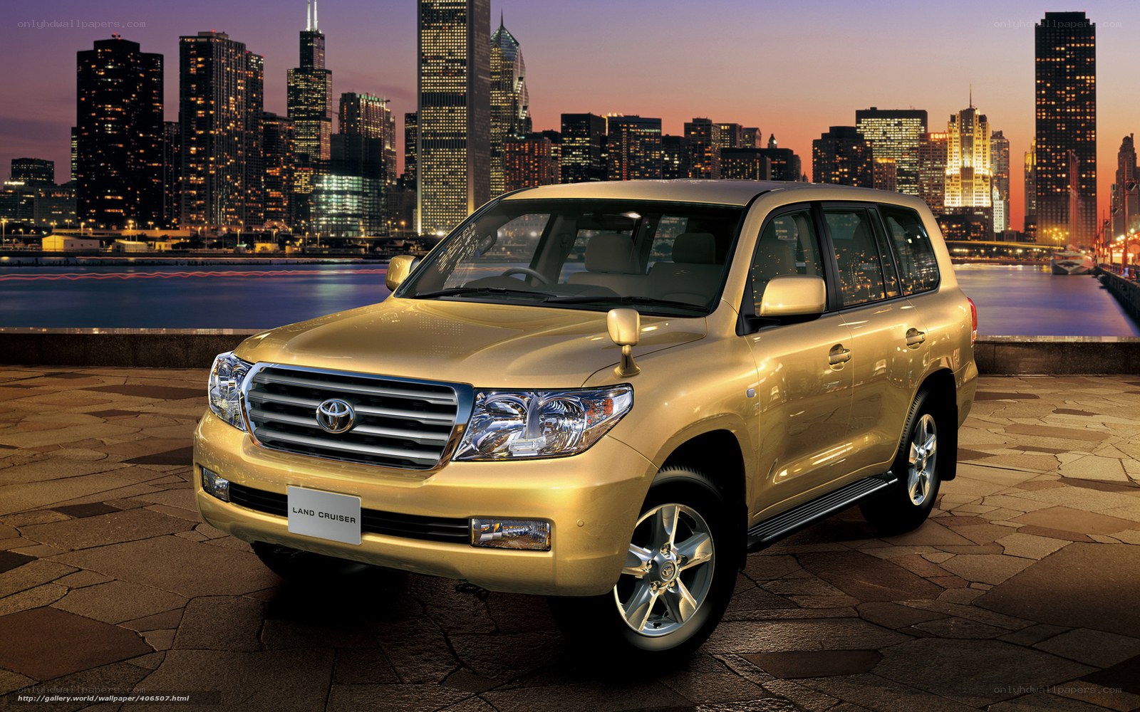 Gold Toyota Land Cruiser at dusk