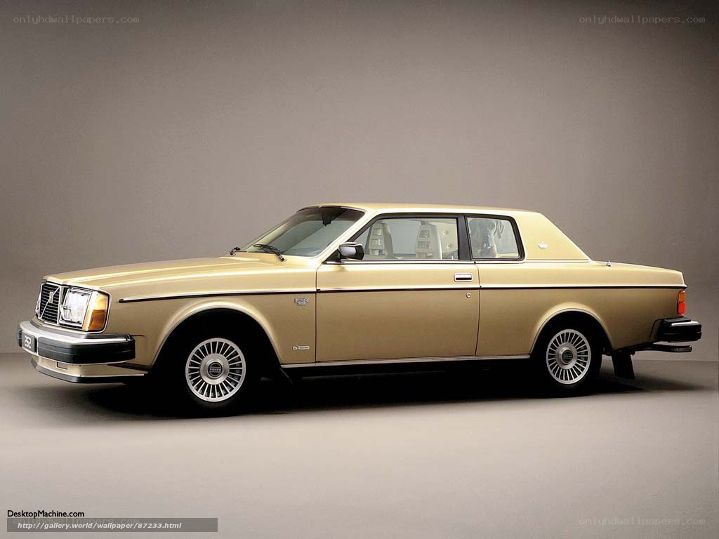 Gold Volvo 240 sedan