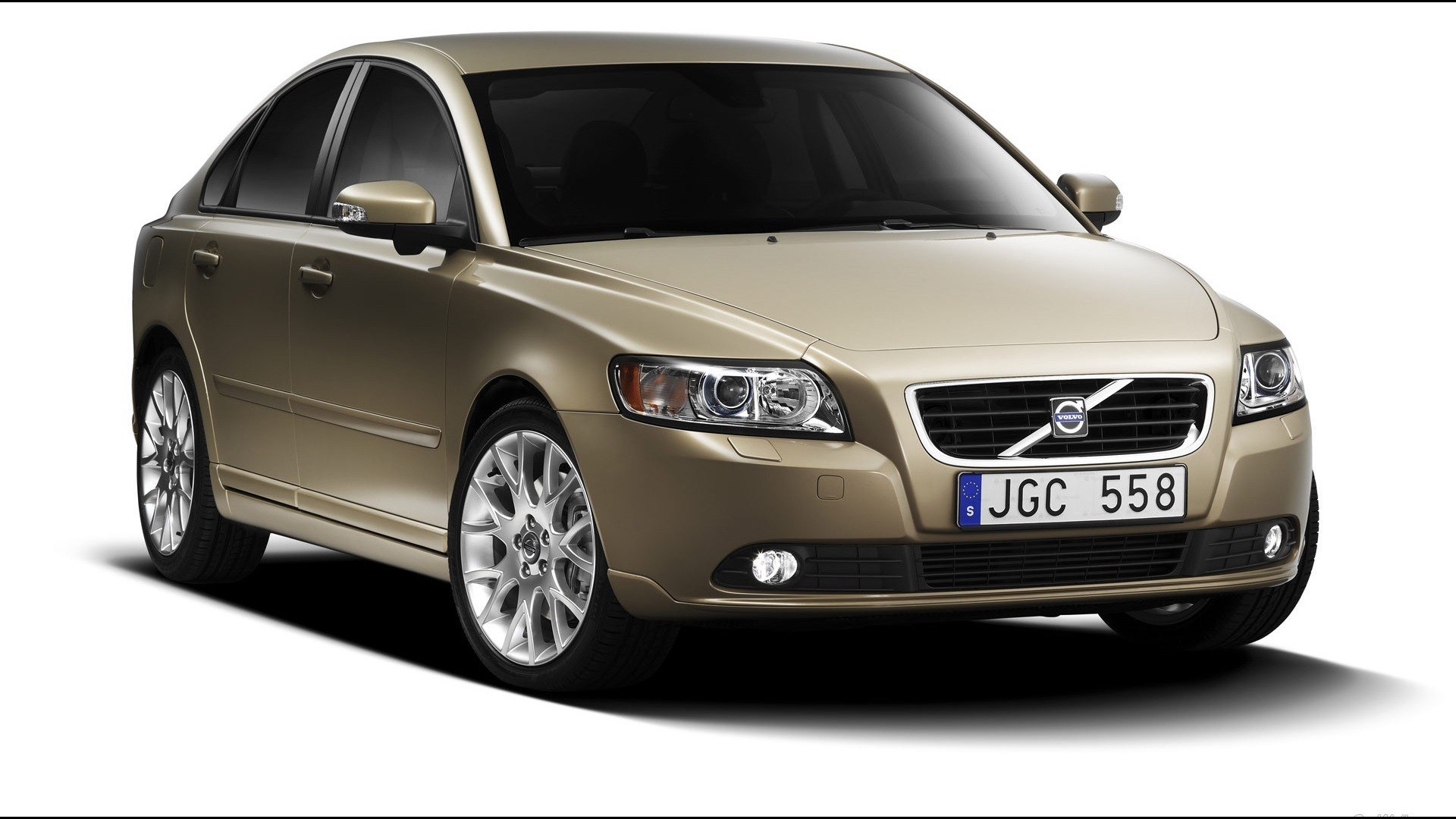 gold volvo sedan