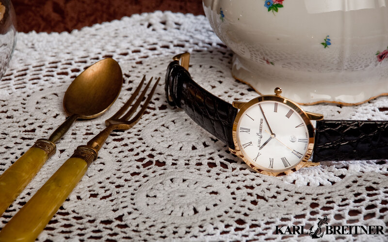 Gold Watch on Lace Table