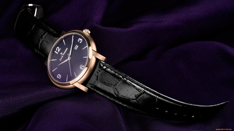 Gold Watch on Purple Cloth