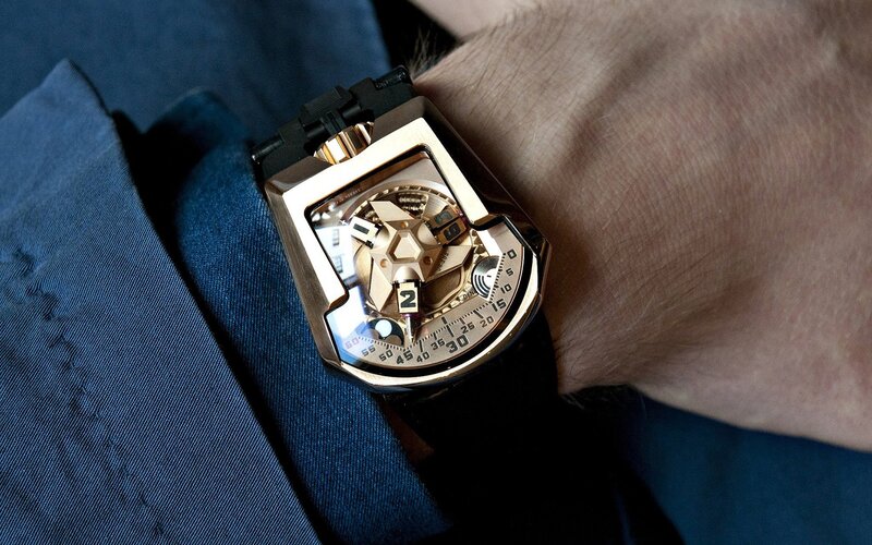 gold watch on wrist
