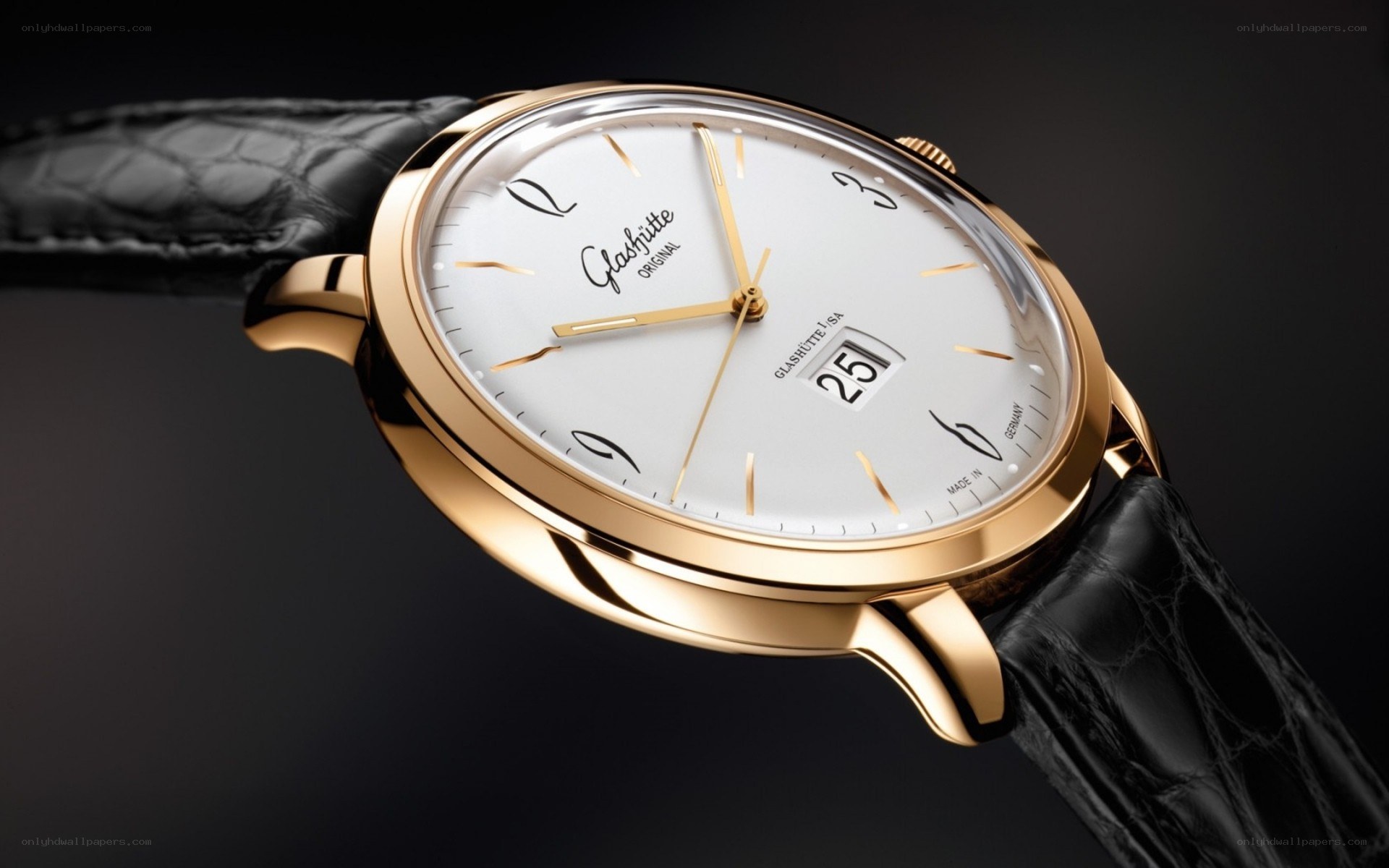gold watch with black strap