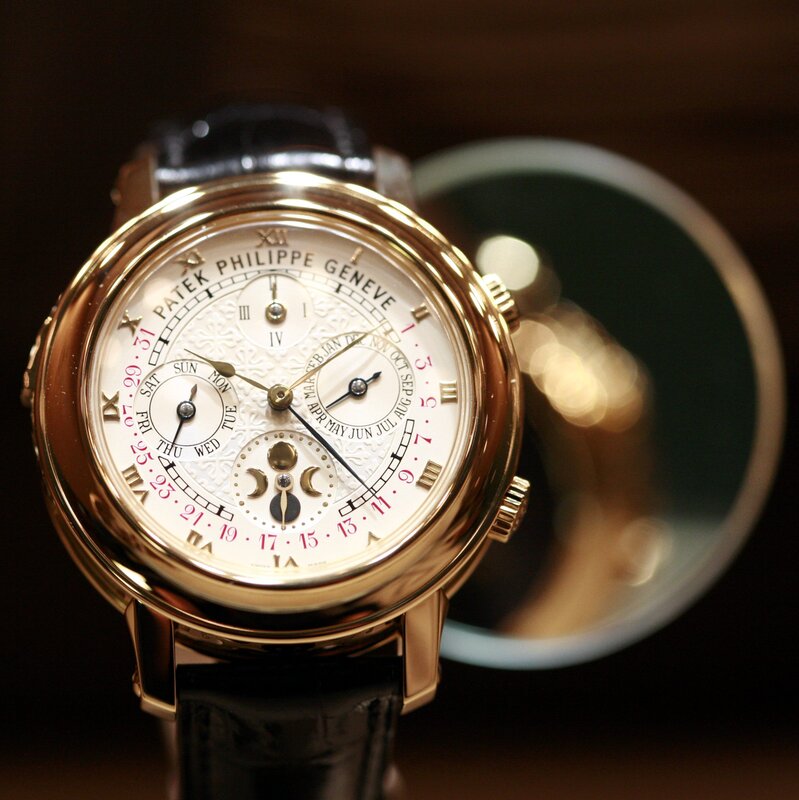 Gold Watch with Black Strap — Dramatic, Photograph, Watch Face, Black Leather Strap, Magnifying Glass