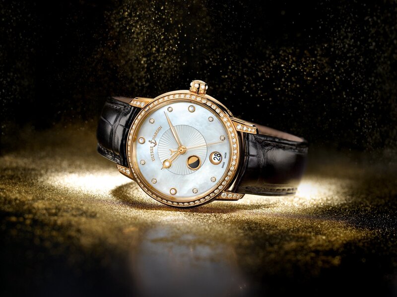 Gold Watch with Black Strap — Luxurious