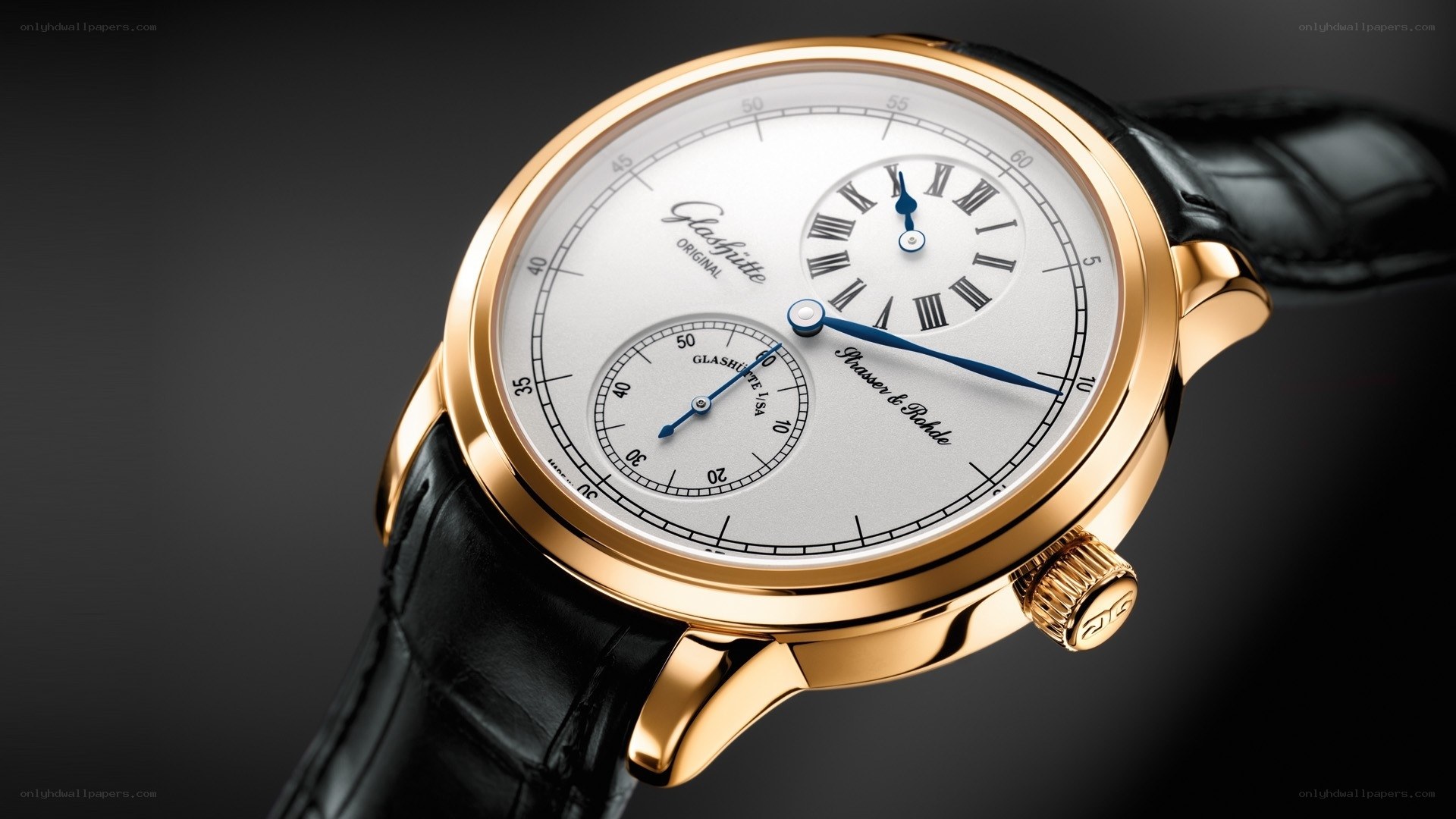 gold watch with black strap