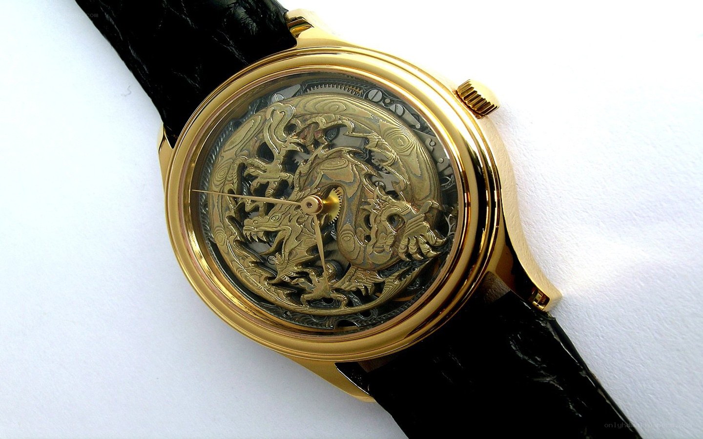 gold watch with dragon design