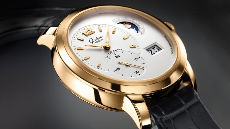 Gold watch with moon phase