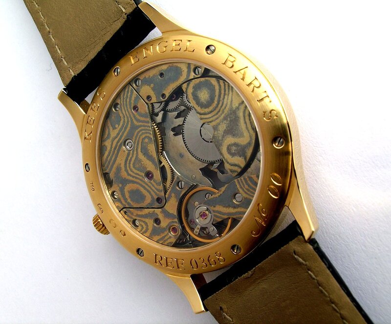 gold watch with visible mechanism