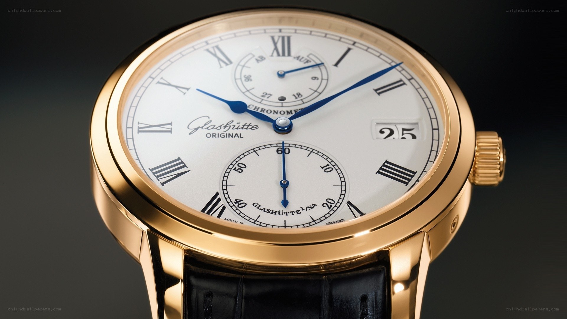 gold watch with white dial