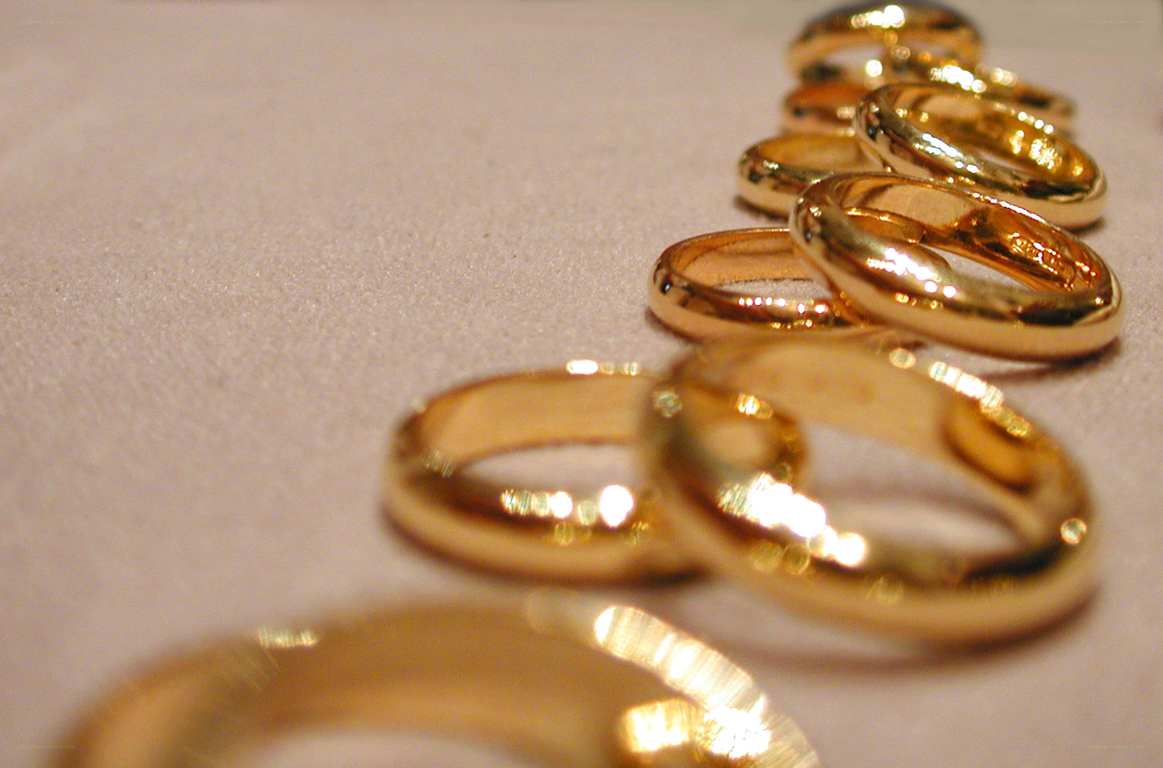 gold wedding rings in a row