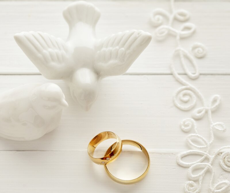 Gold Wedding Rings — White, Serene, Photograph
