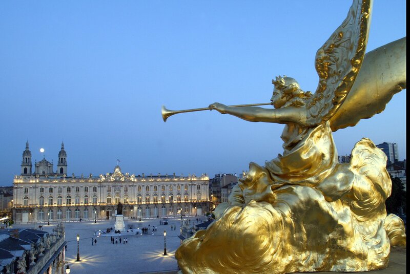 Golden angel statue at dusk