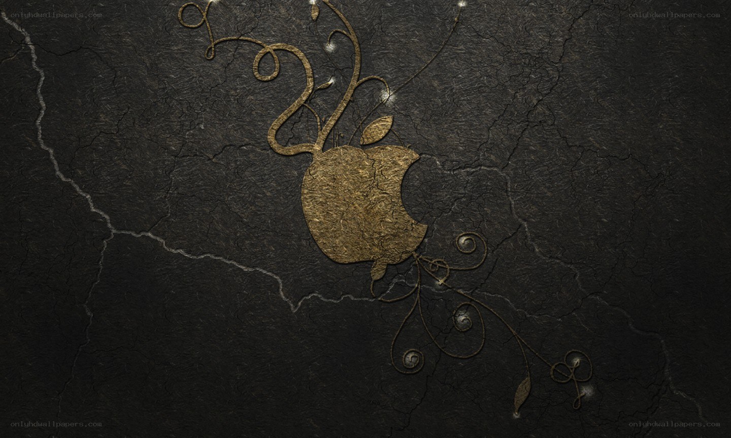 golden apple logo on cracked surface