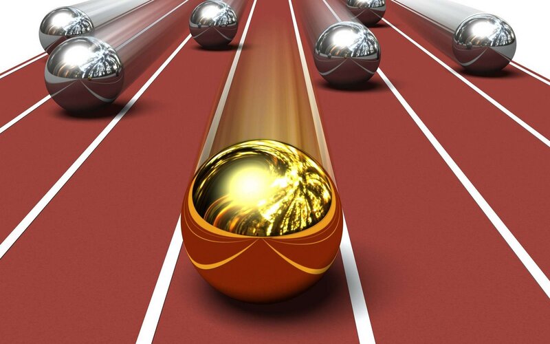 Golden ball leading on a track