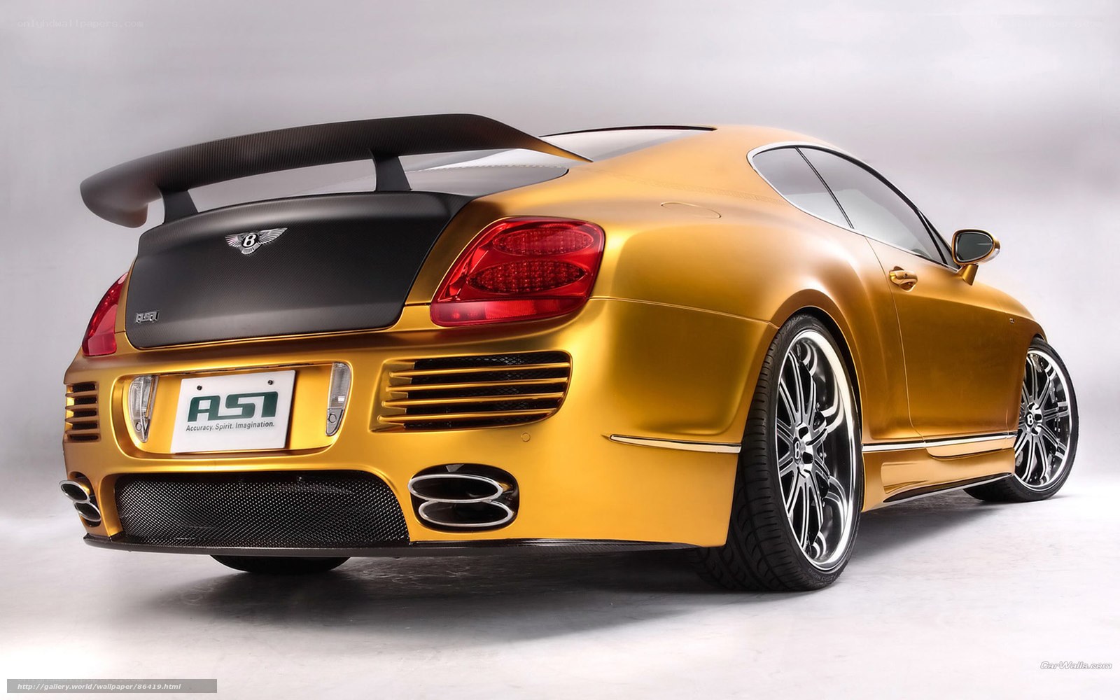 golden bentley with rear spoiler